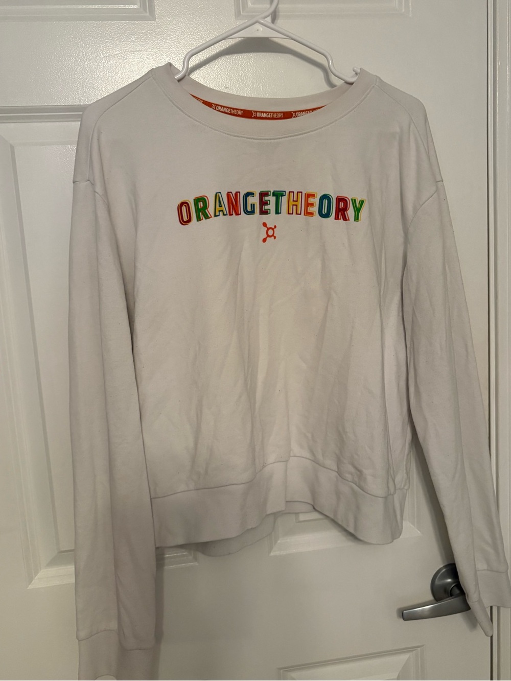 Orangetheory PRIDE Sweatshirt with Orange Neck Trim